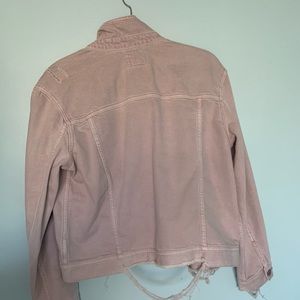 Distressed blush denim jacket